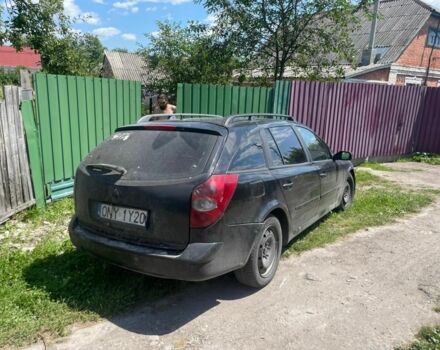Черный Рено Лагуна, объемом двигателя 2 л и пробегом 295 тыс. км за 872 $, фото 1 на Automoto.ua