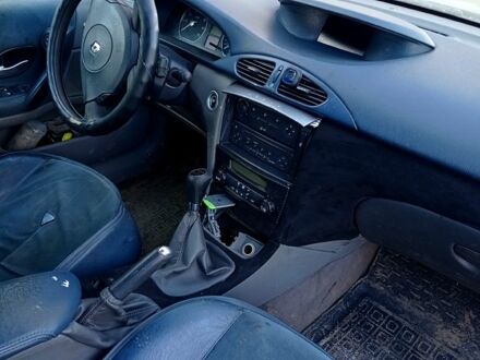 Чорний Рено Лагуна, об'ємом двигуна 2 л та пробігом 325 тис. км за 1800 $, фото 1 на Automoto.ua