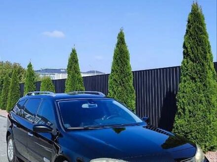 Черный Рено Лагуна, объемом двигателя 2 л и пробегом 284 тыс. км за 4500 $, фото 1 на Automoto.ua