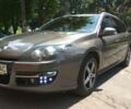 Коричневый Рено Лагуна, объемом двигателя 1.5 л и пробегом 229 тыс. км за 8499 $, фото 1 на Automoto.ua
