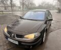 Красный Рено Лагуна, объемом двигателя 1.9 л и пробегом 200 тыс. км за 2000 $, фото 1 на Automoto.ua