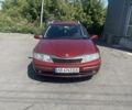 Червоний Рено Лагуна, об'ємом двигуна 1.8 л та пробігом 380 тис. км за 2609 $, фото 1 на Automoto.ua