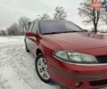 Красный Рено Лагуна, объемом двигателя 2 л и пробегом 260 тыс. км за 4300 $, фото 1 на Automoto.ua