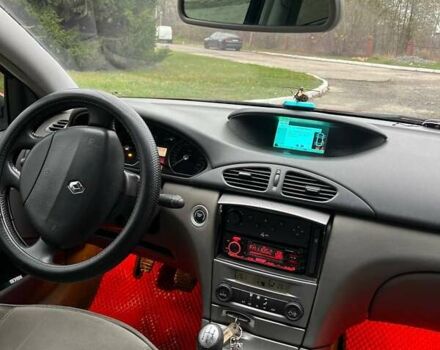 Красный Рено Лагуна, объемом двигателя 1.78 л и пробегом 230 тыс. км за 4300 $, фото 16 на Automoto.ua