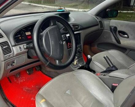 Красный Рено Лагуна, объемом двигателя 1.78 л и пробегом 230 тыс. км за 4300 $, фото 23 на Automoto.ua