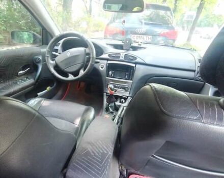 Червоний Рено Лагуна, об'ємом двигуна 2 л та пробігом 222 тис. км за 3500 $, фото 9 на Automoto.ua