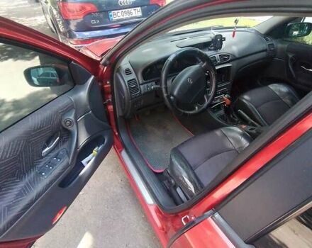 Червоний Рено Лагуна, об'ємом двигуна 2 л та пробігом 222 тис. км за 3500 $, фото 5 на Automoto.ua