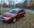 Красный Рено Лагуна, объемом двигателя 2 л и пробегом 310 тыс. км за 2700 $, фото 1 на Automoto.ua