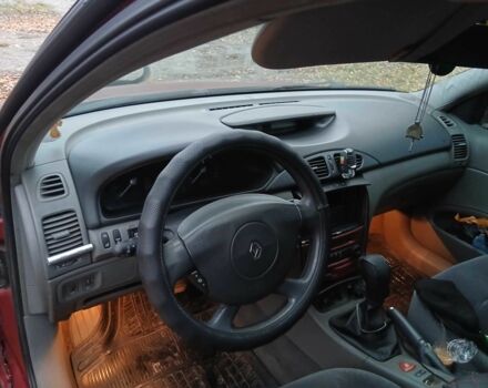 Красный Рено Лагуна, объемом двигателя 2 л и пробегом 310 тыс. км за 2700 $, фото 3 на Automoto.ua