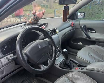 Красный Рено Лагуна, объемом двигателя 2 л и пробегом 296 тыс. км за 4000 $, фото 8 на Automoto.ua