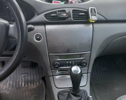 Красный Рено Лагуна, объемом двигателя 2 л и пробегом 296 тыс. км за 4000 $, фото 4 на Automoto.ua