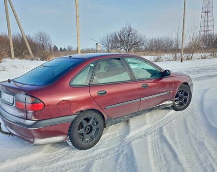 Красный Рено Лагуна, объемом двигателя 1.8 л и пробегом 330 тыс. км за 1396 $, фото 1 на Automoto.ua