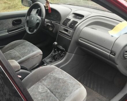 Красный Рено Лагуна, объемом двигателя 1.8 л и пробегом 260 тыс. км за 1800 $, фото 1 на Automoto.ua