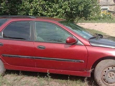 Рено Лагуна 1999 в Краматорске на Automoto.ua Красный Рено Лагуна, объемом двигателя 1.6 л и пробегом 340 тыс. км за 1300 $, фото 1 на Automoto.ua