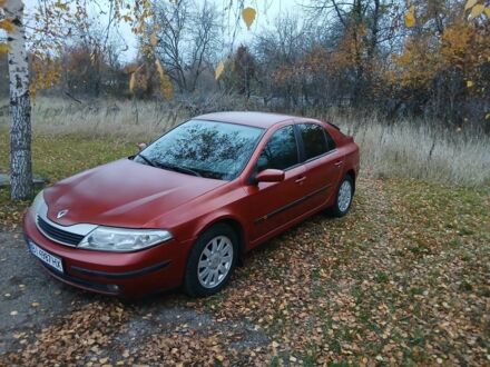 Красный Рено Лагуна, объемом двигателя 2 л и пробегом 310 тыс. км за 2700 $, фото 1 на Automoto.ua