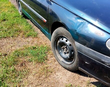 Рено Лагуна, об'ємом двигуна 2 л та пробігом 303 тис. км за 810 $, фото 3 на Automoto.ua