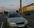 Желтый Рено Лагуна, объемом двигателя 2 л и пробегом 247 тыс. км за 3750 $, фото 1 на Automoto.ua