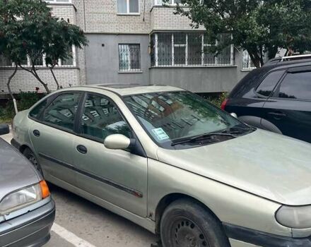 Желтый Рено Лагуна, объемом двигателя 1.9 л и пробегом 236 тыс. км за 550 $, фото 2 на Automoto.ua