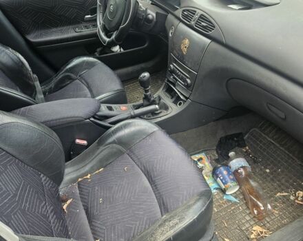 Сірий Рено Лагуна, об'ємом двигуна 1 л та пробігом 300 тис. км за 1207 $, фото 2 на Automoto.ua