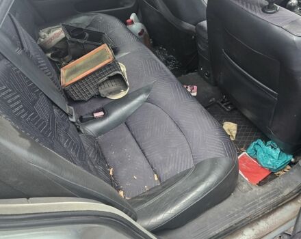 Сірий Рено Лагуна, об'ємом двигуна 1 л та пробігом 300 тис. км за 1207 $, фото 3 на Automoto.ua