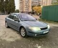Серый Рено Лагуна, объемом двигателя 2 л и пробегом 242 тыс. км за 854 $, фото 1 на Automoto.ua