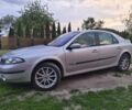 Серый Рено Лагуна, объемом двигателя 2 л и пробегом 145 тыс. км за 5300 $, фото 1 на Automoto.ua