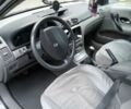 Серый Рено Лагуна, объемом двигателя 2 л и пробегом 200 тыс. км за 3500 $, фото 1 на Automoto.ua
