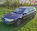 Серый Рено Лагуна, объемом двигателя 2 л и пробегом 240 тыс. км за 3000 $, фото 1 на Automoto.ua
