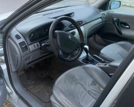 Серый Рено Лагуна, объемом двигателя 2 л и пробегом 300 тыс. км за 1900 $, фото 4 на Automoto.ua