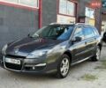 Сірий Рено Лагуна, об'ємом двигуна 2 л та пробігом 234 тис. км за 7850 $, фото 1 на Automoto.ua