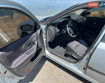 Серый Рено Лагуна, объемом двигателя 1.87 л и пробегом 400 тыс. км за 3500 $, фото 4 на Automoto.ua