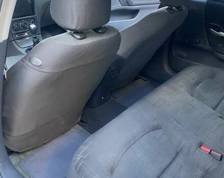 Серый Рено Лагуна, объемом двигателя 1.9 л и пробегом 274 тыс. км за 4300 $, фото 3 на Automoto.ua