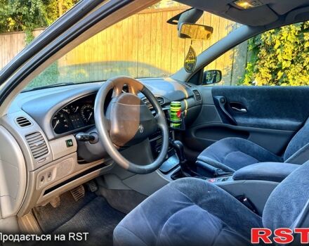 Сірий Рено Лагуна, об'ємом двигуна 2 л та пробігом 275 тис. км за 3050 $, фото 8 на Automoto.ua