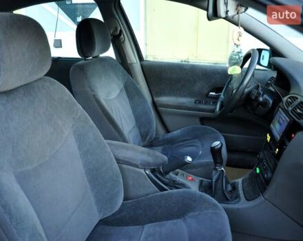 Серый Рено Лагуна, объемом двигателя 1.8 л и пробегом 220 тыс. км за 3300 $, фото 27 на Automoto.ua