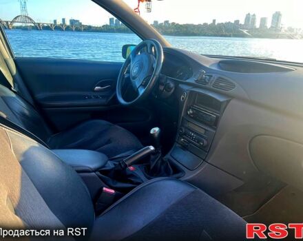 Серый Рено Лагуна, объемом двигателя 2 л и пробегом 167 тыс. км за 4000 $, фото 9 на Automoto.ua