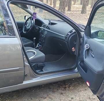 Сірий Рено Лагуна, об'ємом двигуна 1.6 л та пробігом 218 тис. км за 5100 $, фото 8 на Automoto.ua