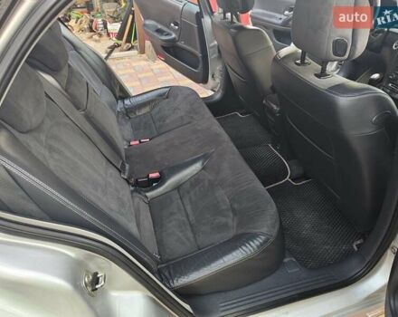 Серый Рено Лагуна, объемом двигателя 2 л и пробегом 150 тыс. км за 5200 $, фото 2 на Automoto.ua