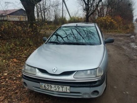 Серый Рено Лагуна, объемом двигателя 1 л и пробегом 777 тыс. км за 929 $, фото 1 на Automoto.ua