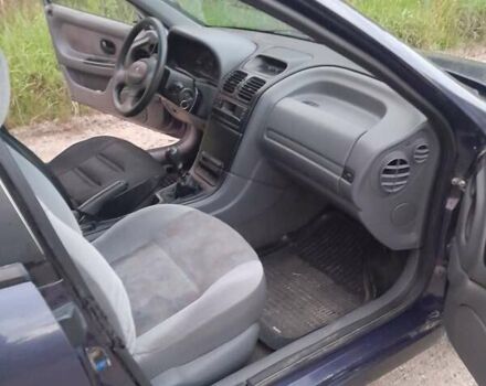 Синій Рено Лагуна, об'ємом двигуна 2 л та пробігом 240 тис. км за 1750 $, фото 6 на Automoto.ua