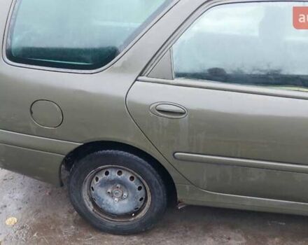 Синий Рено Лагуна, объемом двигателя 1.9 л и пробегом 360 тыс. км за 1000 $, фото 14 на Automoto.ua