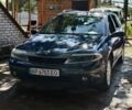 Синий Рено Лагуна, объемом двигателя 2 л и пробегом 290 тыс. км за 3100 $, фото 1 на Automoto.ua