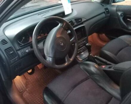 Синий Рено Лагуна, объемом двигателя 1.8 л и пробегом 312 тыс. км за 4300 $, фото 11 на Automoto.ua