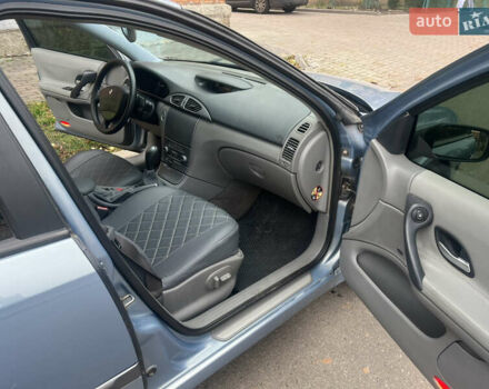 Синий Рено Лагуна, объемом двигателя 2 л и пробегом 293 тыс. км за 4400 $, фото 17 на Automoto.ua