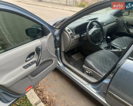 Синий Рено Лагуна, объемом двигателя 2 л и пробегом 293 тыс. км за 4400 $, фото 21 на Automoto.ua