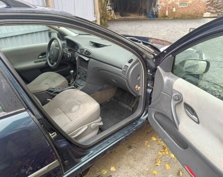 Синий Рено Лагуна, объемом двигателя 1.8 л и пробегом 308 тыс. км за 2400 $, фото 9 на Automoto.ua