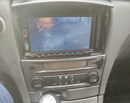 Рено Лагуна 2004 в Волочиске на Automoto.ua Синий Рено Лагуна, объемом двигателя 1.9 л и пробегом 281 тыс. км за 3200 $, фото 39 на Automoto.ua