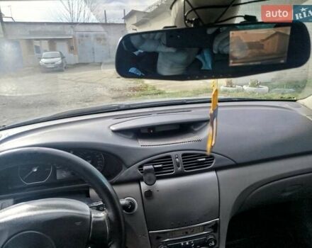 Рено Лагуна 2004 в Волочиске на Automoto.ua Синий Рено Лагуна, объемом двигателя 1.9 л и пробегом 281 тыс. км за 3200 $, фото 41 на Automoto.ua