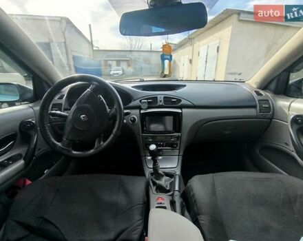 Рено Лагуна 2004 в Волочиске на Automoto.ua Синий Рено Лагуна, объемом двигателя 1.9 л и пробегом 281 тыс. км за 3200 $, фото 10 на Automoto.ua