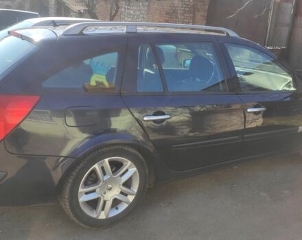 Синій Рено Лагуна, об'ємом двигуна 2 л та пробігом 305 тис. км за 3700 $, фото 3 на Automoto.ua