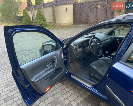 Синий Рено Лагуна, объемом двигателя 2 л и пробегом 240 тыс. км за 4800 $, фото 4 на Automoto.ua